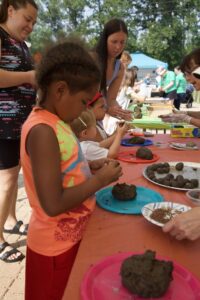 Making seed balls at Monarch Fest
