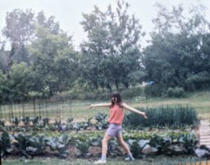 Sayde with her childhood garden
