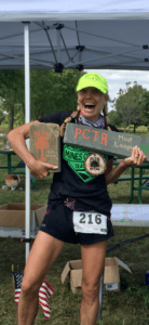 Michelle Basler with trail running trophy