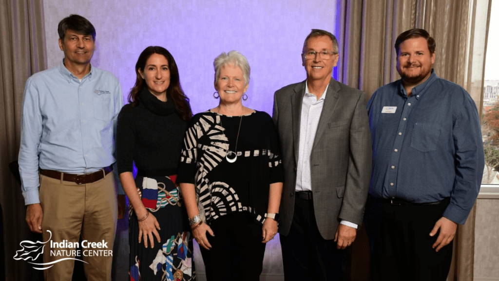 Lisa Henderson with husband, Jeff, and ICNC staff members