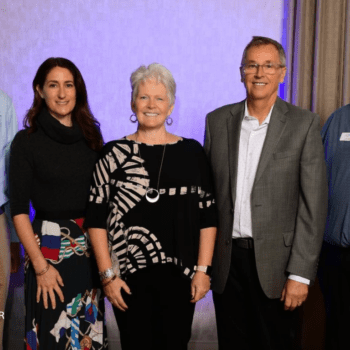 Lisa Henderson with husband, Jeff, and ICNC staff members