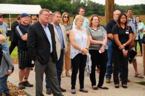 Lisa (center) at opening ceremony for Amazing Space