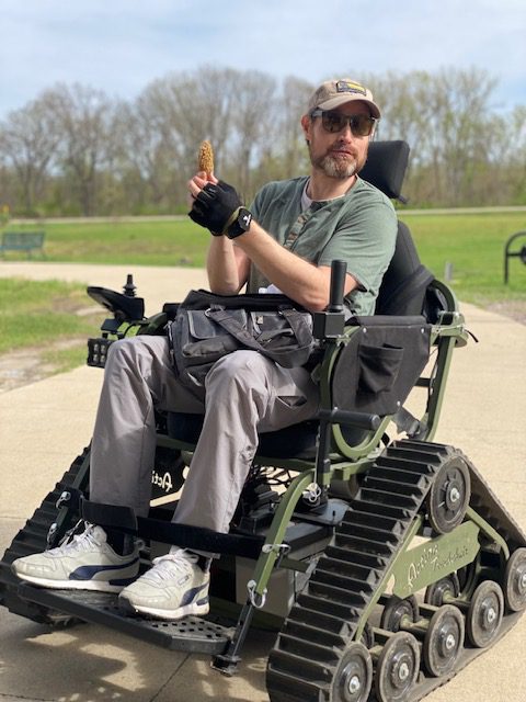 Eric with a morel mushroom