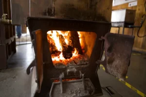 Wood-burning stove heats the Sugar House